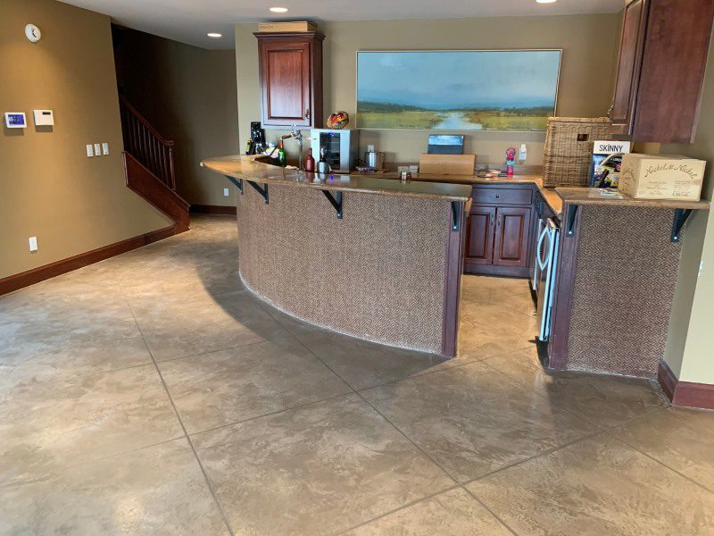 Stained concrete floor in loft bar area