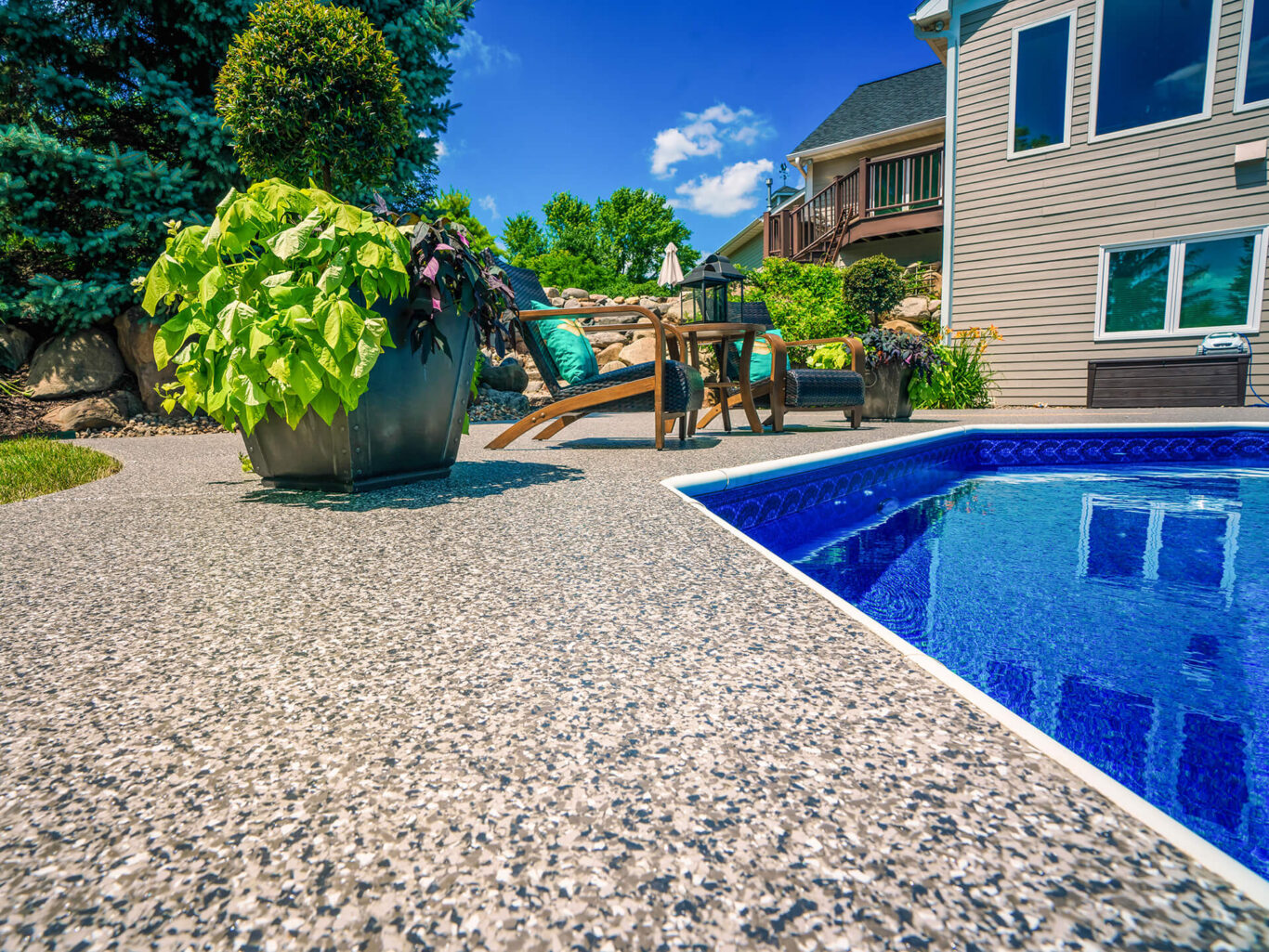 Decorative flake coating around backyard pool