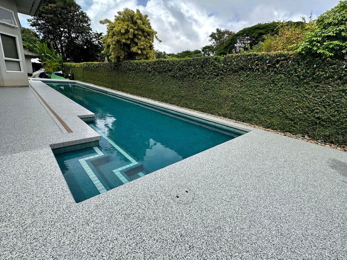 Chip broadcast coating on outdoor pool deck